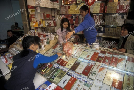 a cigaret shop on the Market streets of Chongqing in the province of Sichuan in china in east asia. 