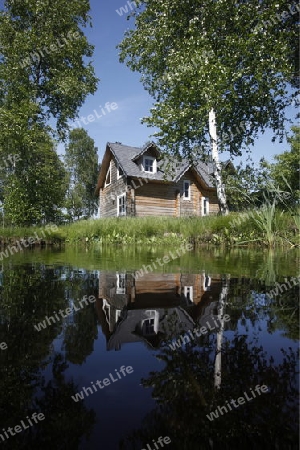 a House on a smal lake near the city of Vilnius and the Baltic State of Lithuania,  