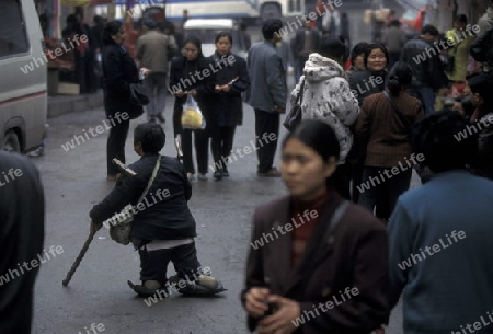People at the main square in the city of Chongqing in the province of Sichuan in china in east asia. 