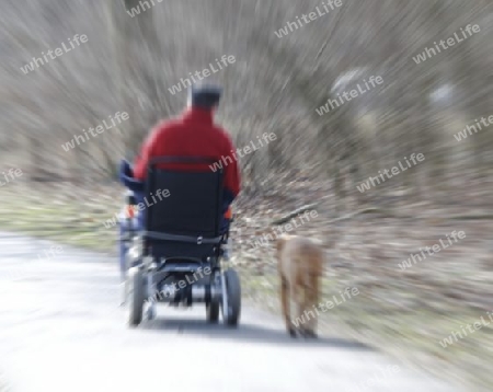 handycapped person with dog moving around