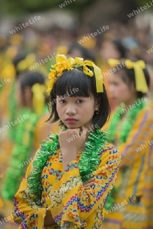 Traditional Dance Girls at the Thingyan Water Festival at the Myanmar New Year in the city centre of Mandalay in Manamar in Southeastasia.