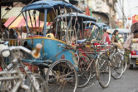 Bicycle Ricksha Taxis at the morning Market in Nothaburi in the north of city of Bangkok in Thailand in Southeastasia.