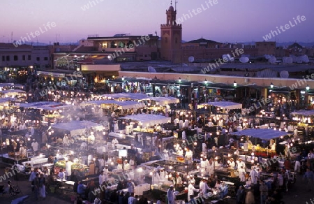 The Streetfood and Nightlife at the Djemma del Fna Square in the old town of Marrakesh in Morocco in North Africa.
