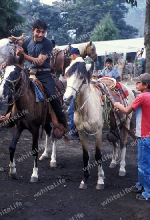 cowboys in the town of Antigua in Guatemala in central America.   