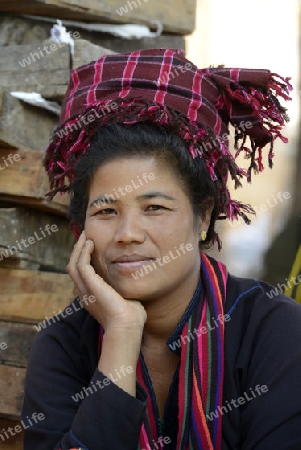 a women at the Market at the Village of Phaung Daw Oo at the Inle Lake in the Shan State in the east of Myanmar in Southeastasia.