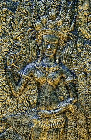 a apsara relief in a temple in Angkor at the town of siem riep in cambodia in southeastasia. 
