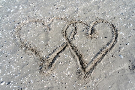 Herzen im Sand