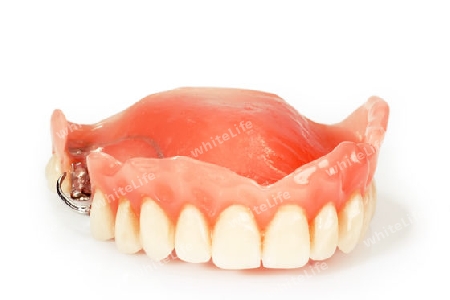 Zahnprothese auf hellem Hintergrund