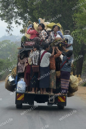 People on a pick-up Taxi near the town of Nyaungshwe at the Inle Lake in the Shan State in the east of Myanmar in Southeastasia.