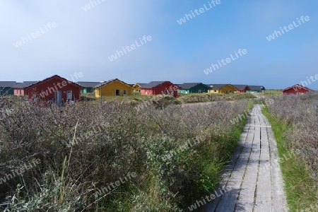 Holzhäuser am Strand von Helgolands Düne