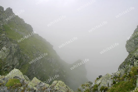 Nebel am Berg Mangart