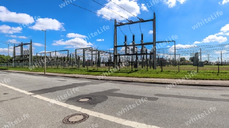 Electrical Transformer. Distribution of electric energy at a big substation with lots power lines