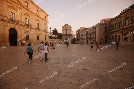The Piazza del Domo in the old Town of Siracusa in Sicily in south Italy in Europe.
