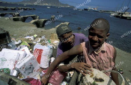Hungry People near the Market in the city of  Mindelo on the Island of Sao Vicente on Cape Verde in the Atlantic Ocean in Africa.
