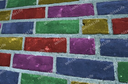 Beautiful rainbow colored bricks on an old vintage wall texture