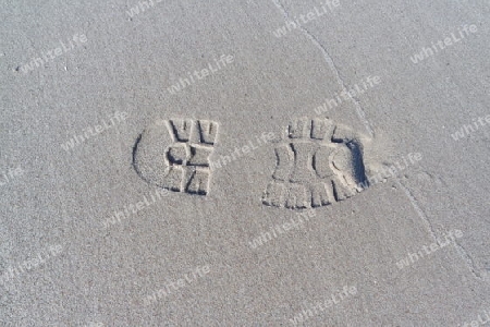 Schuhspur im Sand