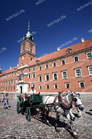 The Zamkowy Square in the old Town in the City of Warsaw in Poland.