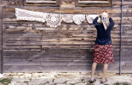 a women in the old town of  Nesebar on the coast of the Black sea in Bulgaria in east Europe.