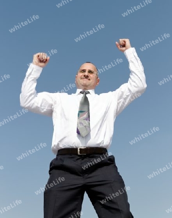 happy businessman is jumping outdoor