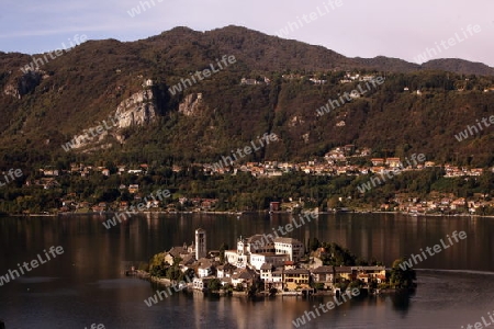 The Isla San Giulio in the Ortasee outside of the Fishingvillage of Orta on the Lake Orta in the Lombardia  in north Italy. 