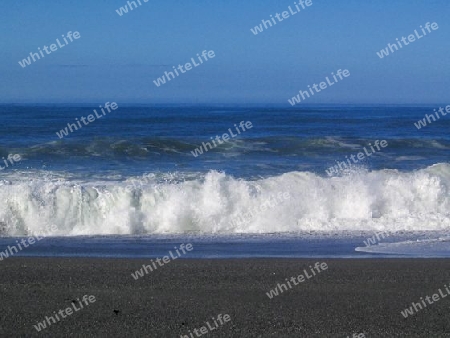 Breaking Wave on Black Sand Beach