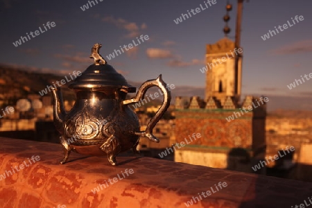 A Minttea in a teahouse in the old City in the historical Town of Fes in Morocco in north Africa.