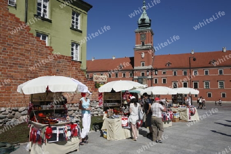 The Zamkowy Square in the old Town in the City of Warsaw in Poland.