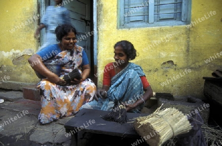 women at a factory of  Incense Sticks in the city of Mysore in the province Karnataka in India.