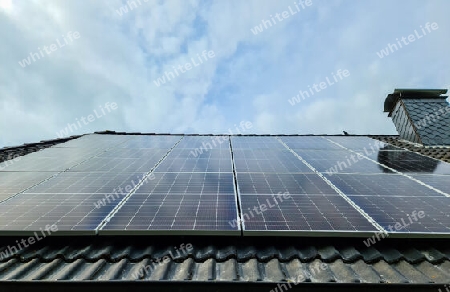 View at new solar panels on the roof of a residential house