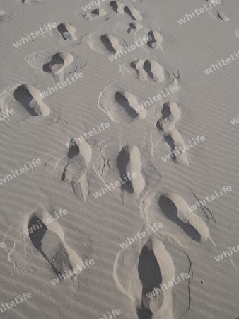 Schuhspuren im Sand