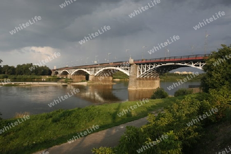 A Bridge and the Wistla River in the City of Warsaw in Poland, East Europe.