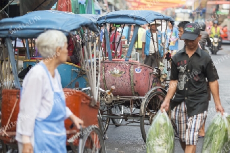 Bicycle Ricksha Taxis at the morning Market in Nothaburi in the north of city of Bangkok in Thailand in Southeastasia.