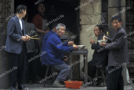 people on the streets of Chongqing in the province of Sichuan in china in east asia. 