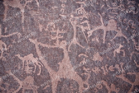 Pre Historic Paintings in a Rock in the Wadi Rum Desert in Jordan in the middle east.