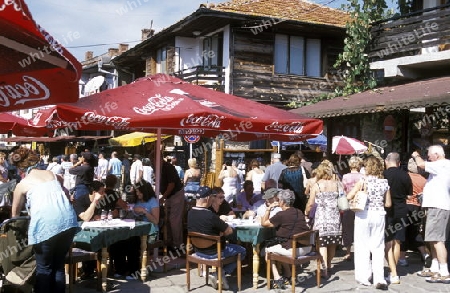 a cafe in the old town of  Nesebar on the coast of the Black sea in Bulgaria in east Europe.