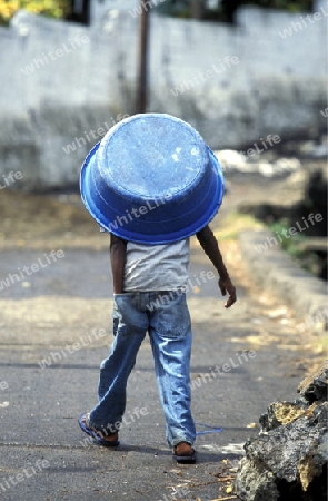 a boy in the city of Moutsamudu on the Island of Anjouan on the Comoros Ilands in the Indian Ocean in Africa.   