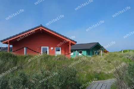Holzhäuser am Strand von Helgolands Düne