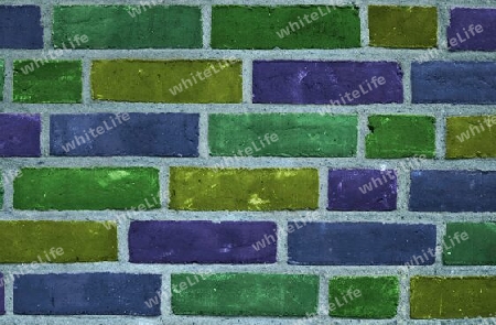Beautiful rainbow colored bricks on an old vintage wall texture