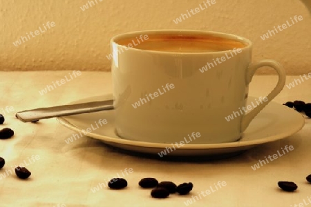 Kaffeetasse mit Kaffebohnen