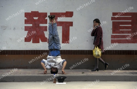 a men ask for money in the city of Chongqing in the province of Sichuan in china in east asia. 