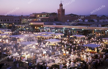 The Streetfood and Nightlife at the Djemma del Fna Square in the old town of Marrakesh in Morocco in North Africa.
