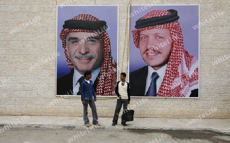Pictures of the King Hussein, left, and his son and new King Abdullah, right, in the Village of Wadi Musa near the Temple city of Petra in Jordan in the middle east.