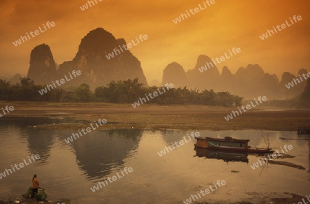 the landscape at the Li River near Yangshou near the city of  Guilin in the Province of Guangxi in china in east asia. 