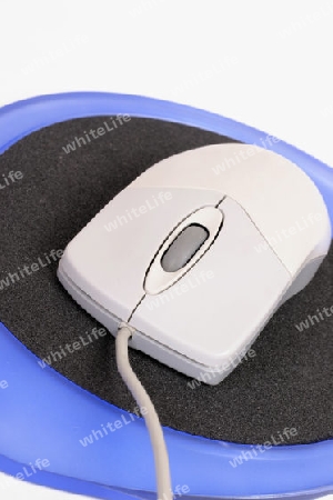 Computer mouse on blue
