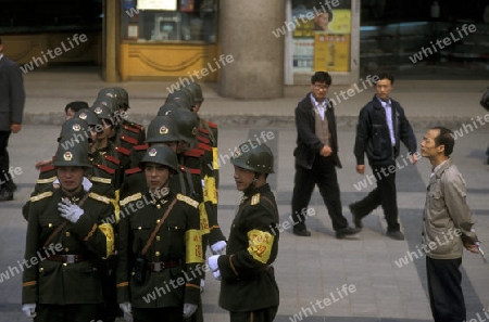 The army and people on the streets of Chongqing in the province of Sichuan in china in east asia. 
