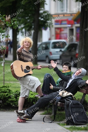 Kids play music and dance in the City Vilnius with the Cityhall  in the Baltic State of Lithuania,  