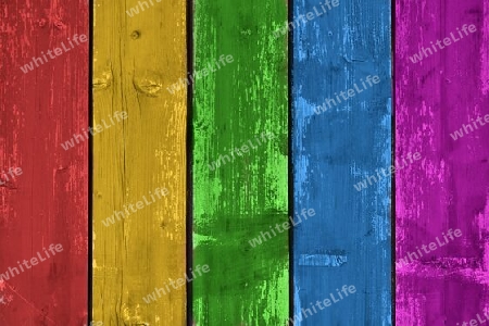 Rainbow colored wooden plank background. Texture with copy space