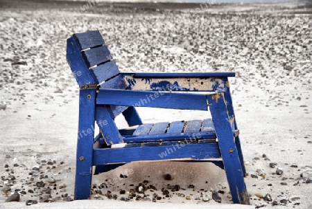  A stranded chair on the beach in Denmark