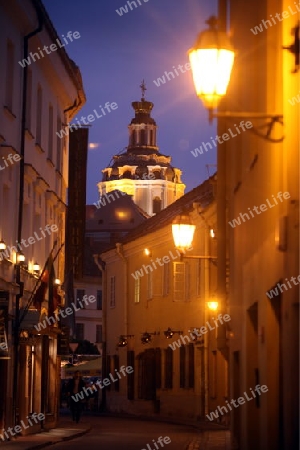 The old Town of the City Vilnius with the clocktower and the Johanneschurch  in the Baltic State of Lithuania,  