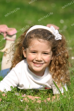 little girl in the garden